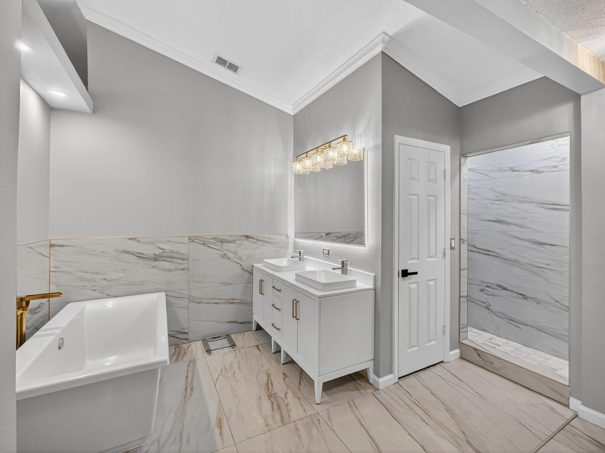 4125 Southwest Webb Street Port St. Lucie, FL 34953 - Photo 16 of 29 a bathroom with a sink a toilet and shower