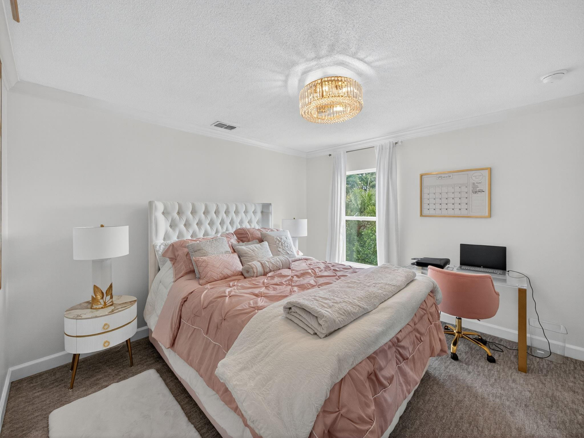 4125 Southwest Webb Street Port St. Lucie, FL 34953 - Photo 18 of 29 a bedroom with a bed and a desk