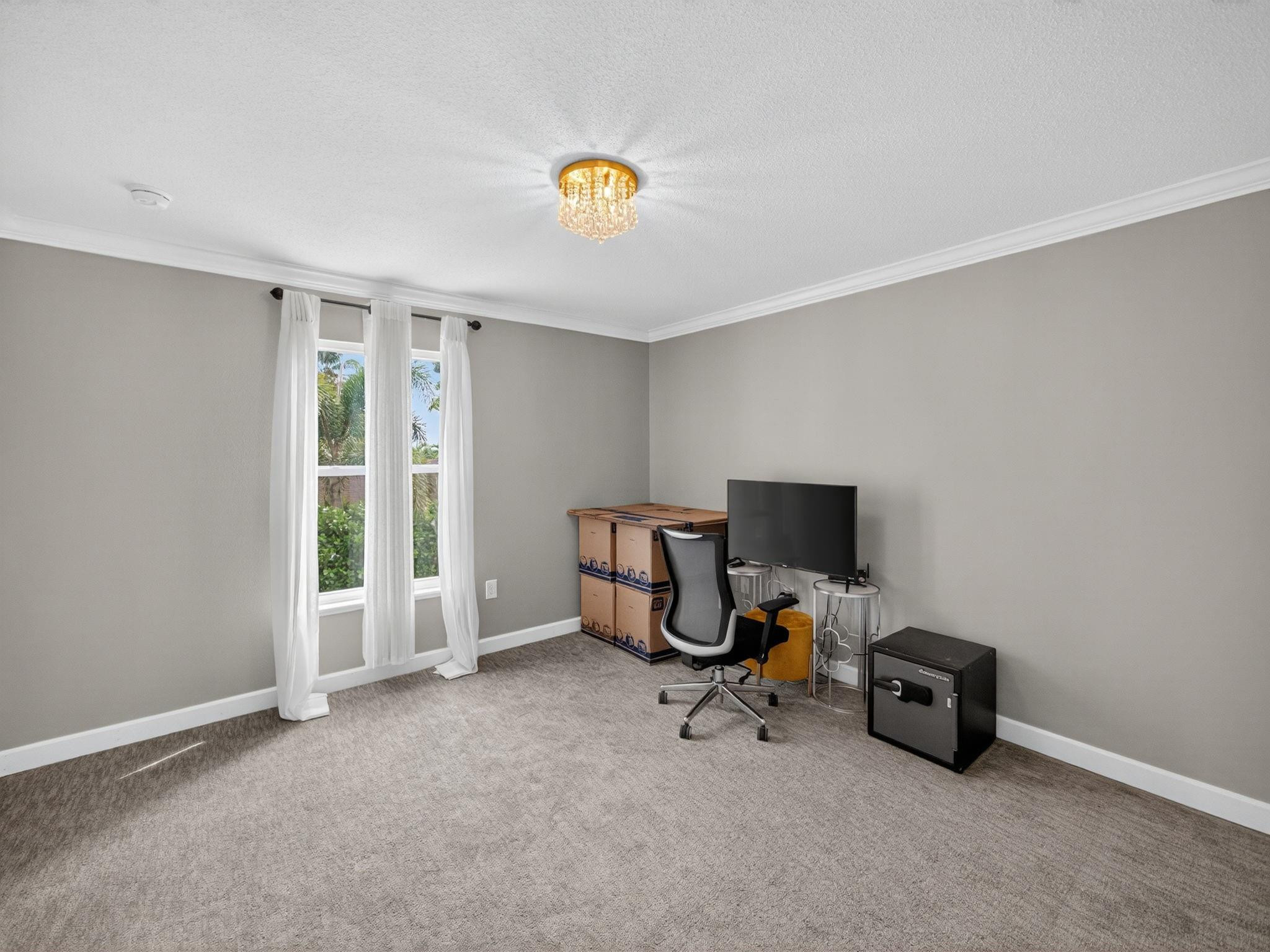 4125 Southwest Webb Street Port St. Lucie, FL 34953 - Photo 21 of 29 a view of a livingroom with a workspace