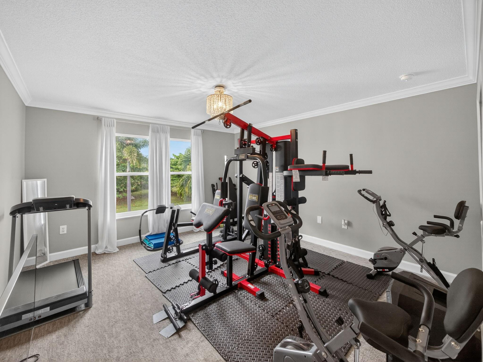 4125 Southwest Webb Street Port St. Lucie, FL 34953 - Photo 22 of 29 a view of a room with gym equipment