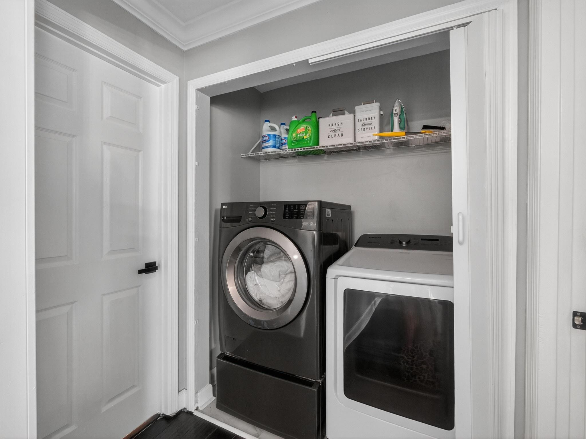 4125 Southwest Webb Street Port St. Lucie, FL 34953 - Photo 23 of 29 a utility room with dryer and washer
