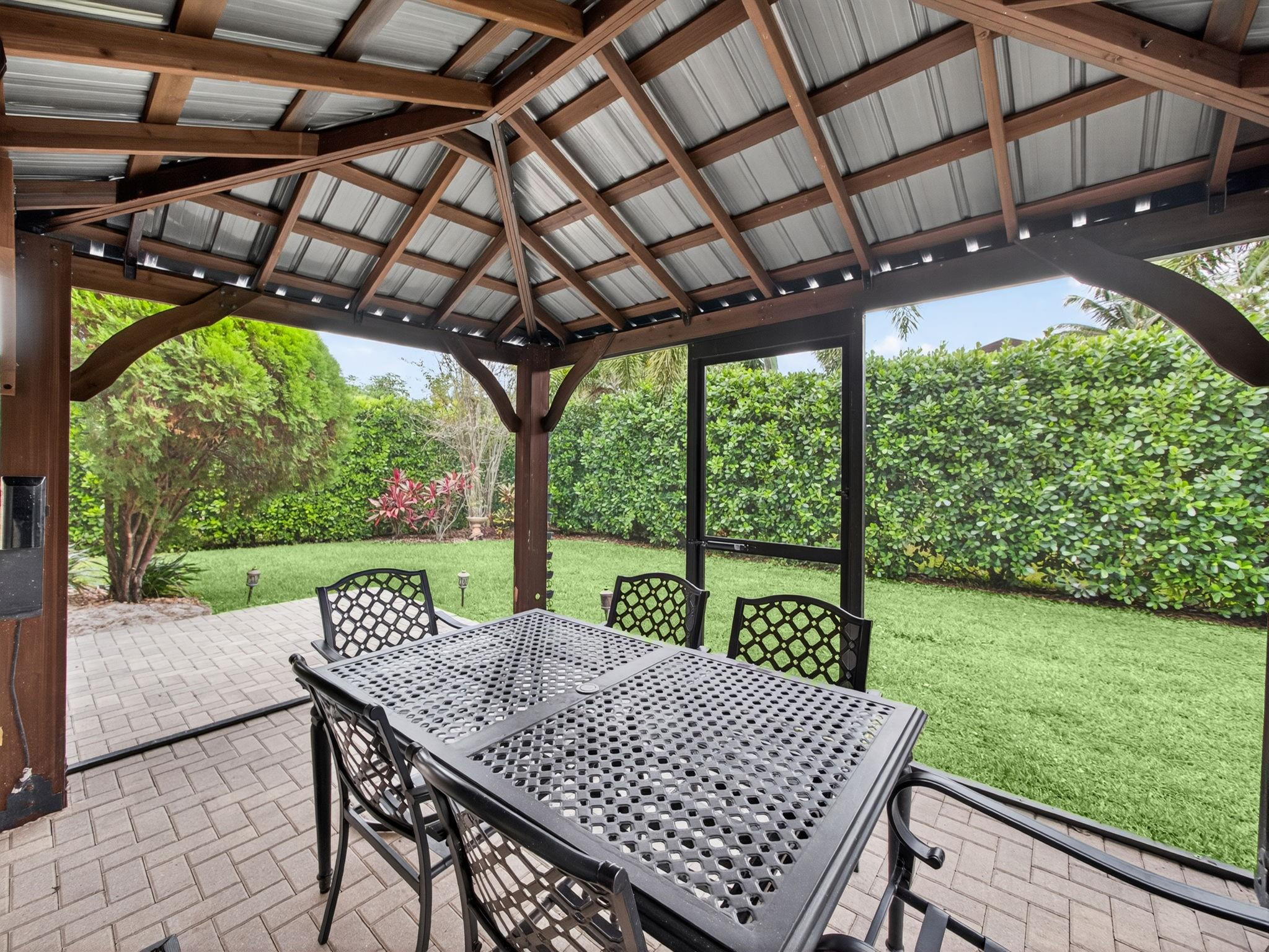 4125 Southwest Webb Street Port St. Lucie, FL 34953 - Photo 24 of 29 a view of yard with patio