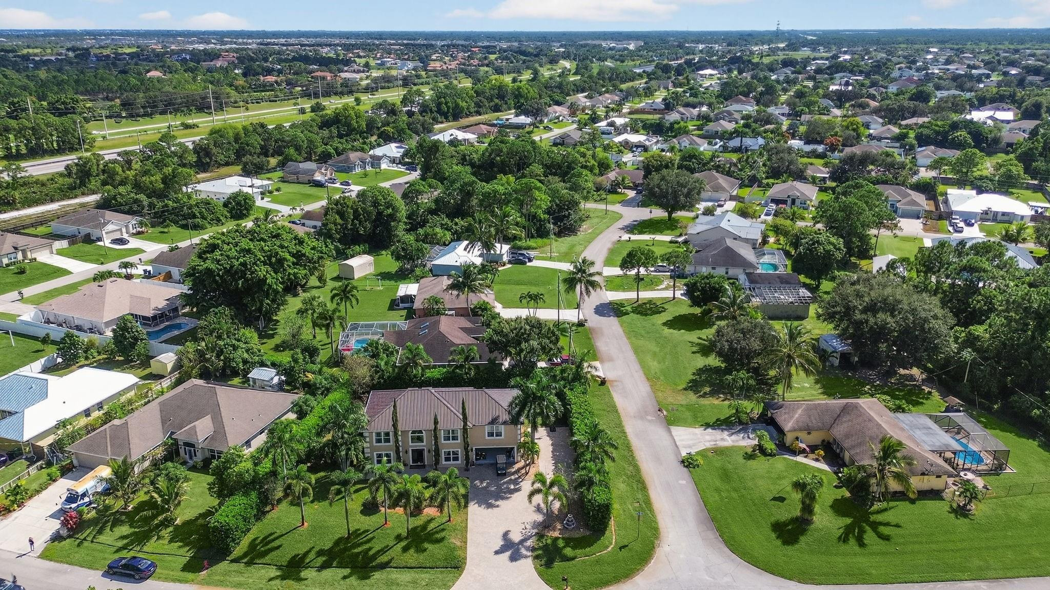 4125 Southwest Webb Street Port St. Lucie, FL 34953 - Photo 27 of 29 an aerial view of multiple house