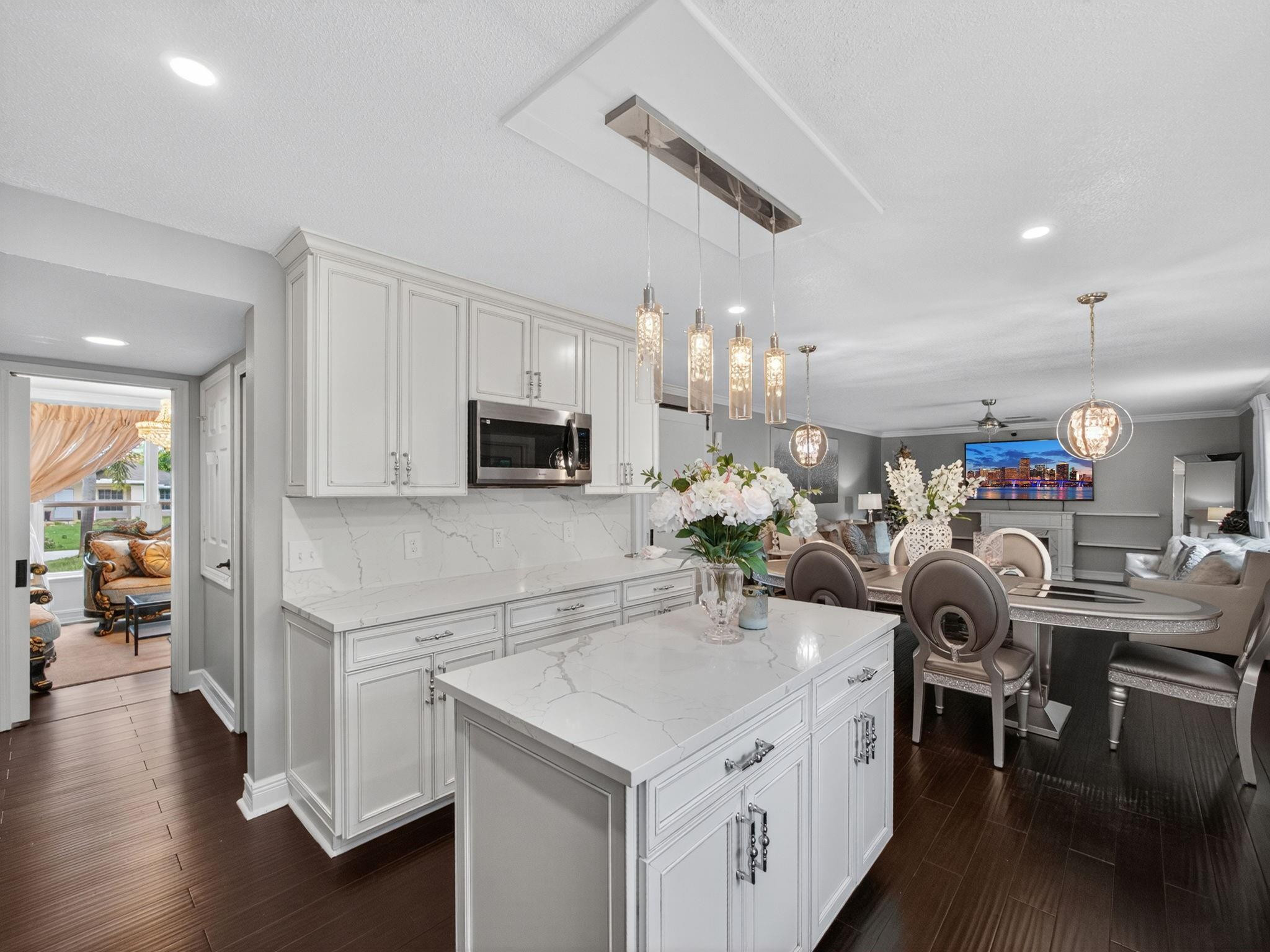 4125 Southwest Webb Street Port St. Lucie, FL 34953 - Photo 9 of 29 a kitchen with a sink appliances and cabinets