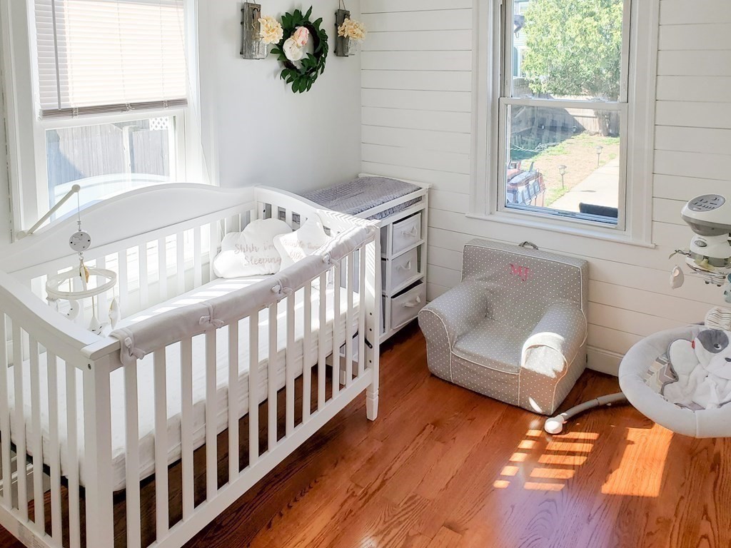 16 Griffin Road Peabody, MA 01960 - Photo 14 of 26 a bedroom with furniture and a window