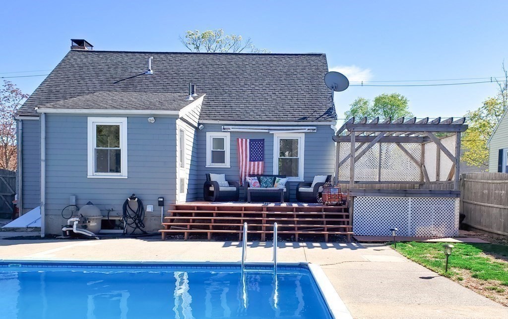 16 Griffin Road Peabody, MA 01960 - Photo 22 of 26 a house view with a sink and yard in front of it