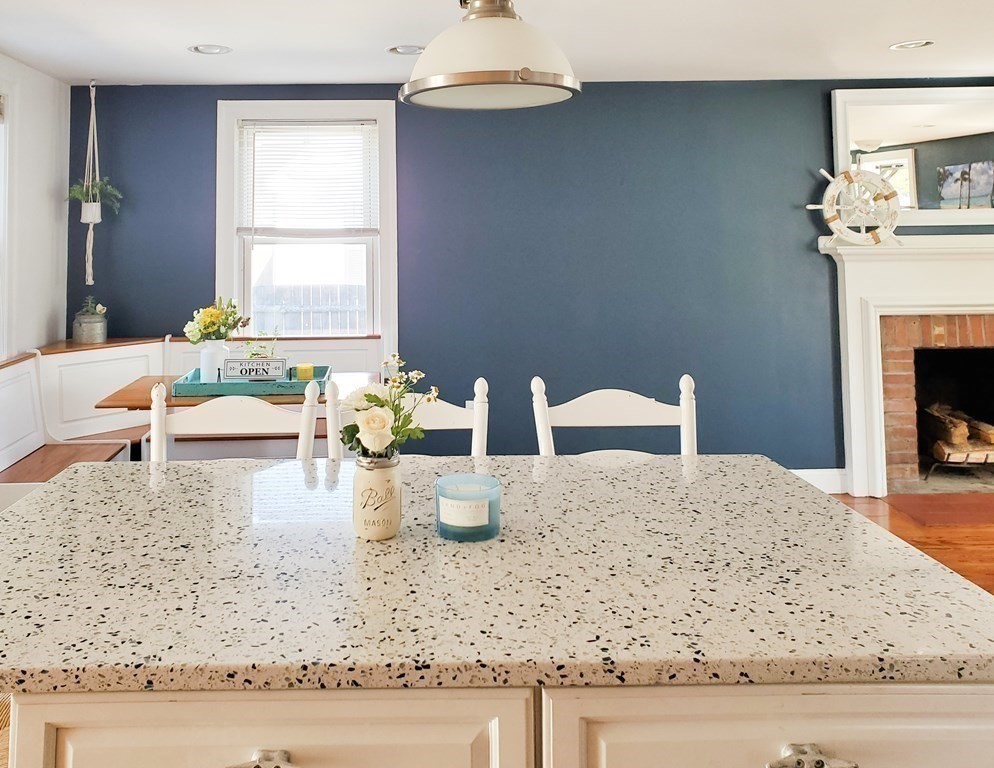 16 Griffin Road Peabody, MA 01960 - Photo 8 of 26 a view of living room with furniture and fireplace