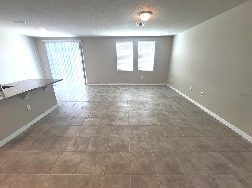 1618 Bark Rdg Drive Auburndale, FL 33823 - Photo 13 of 40 an empty room with windows