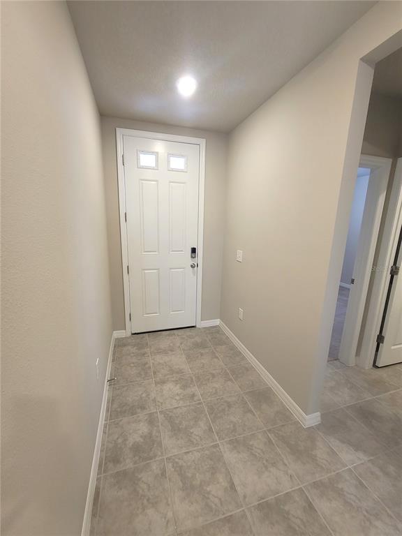 1618 Bark Rdg Drive Auburndale, FL 33823 - Photo 3 of 40 an empty room with windows