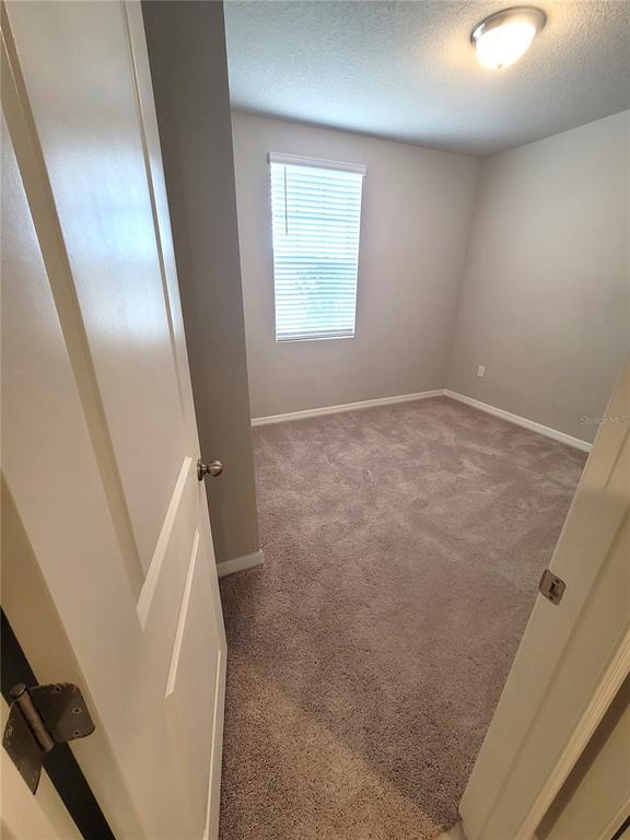 1618 Bark Rdg Drive Auburndale, FL 33823 - Photo 5 of 40 an empty room with windows