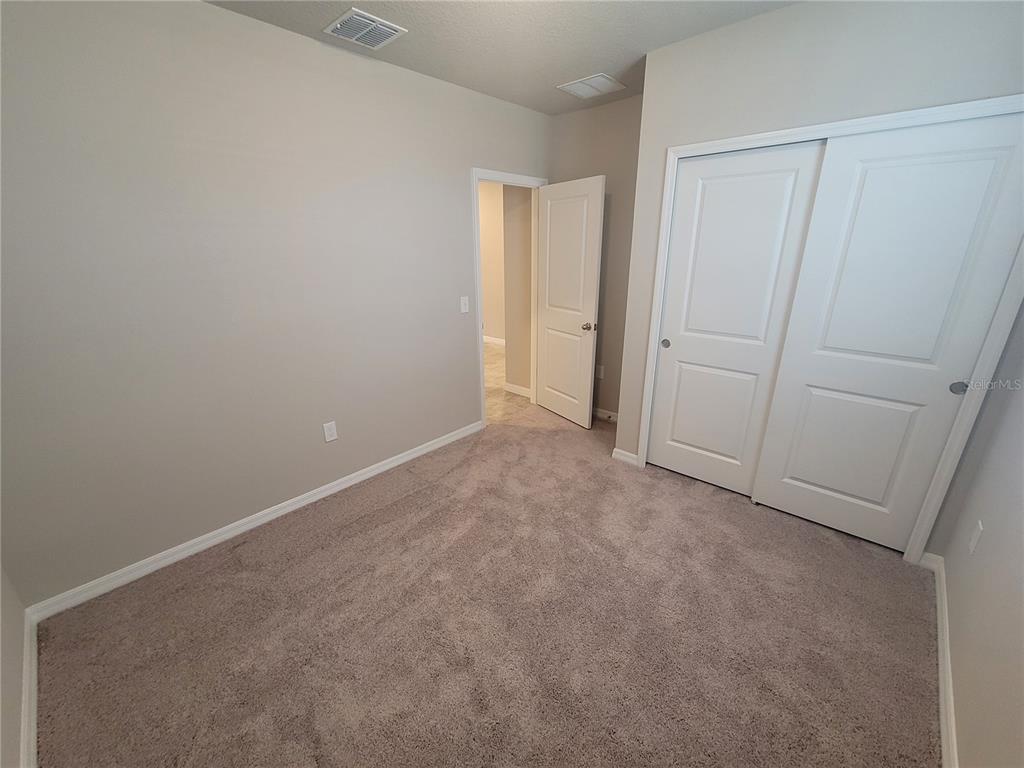 1618 Bark Rdg Drive Auburndale, FL 33823 - Photo 7 of 40 an empty room with closet area