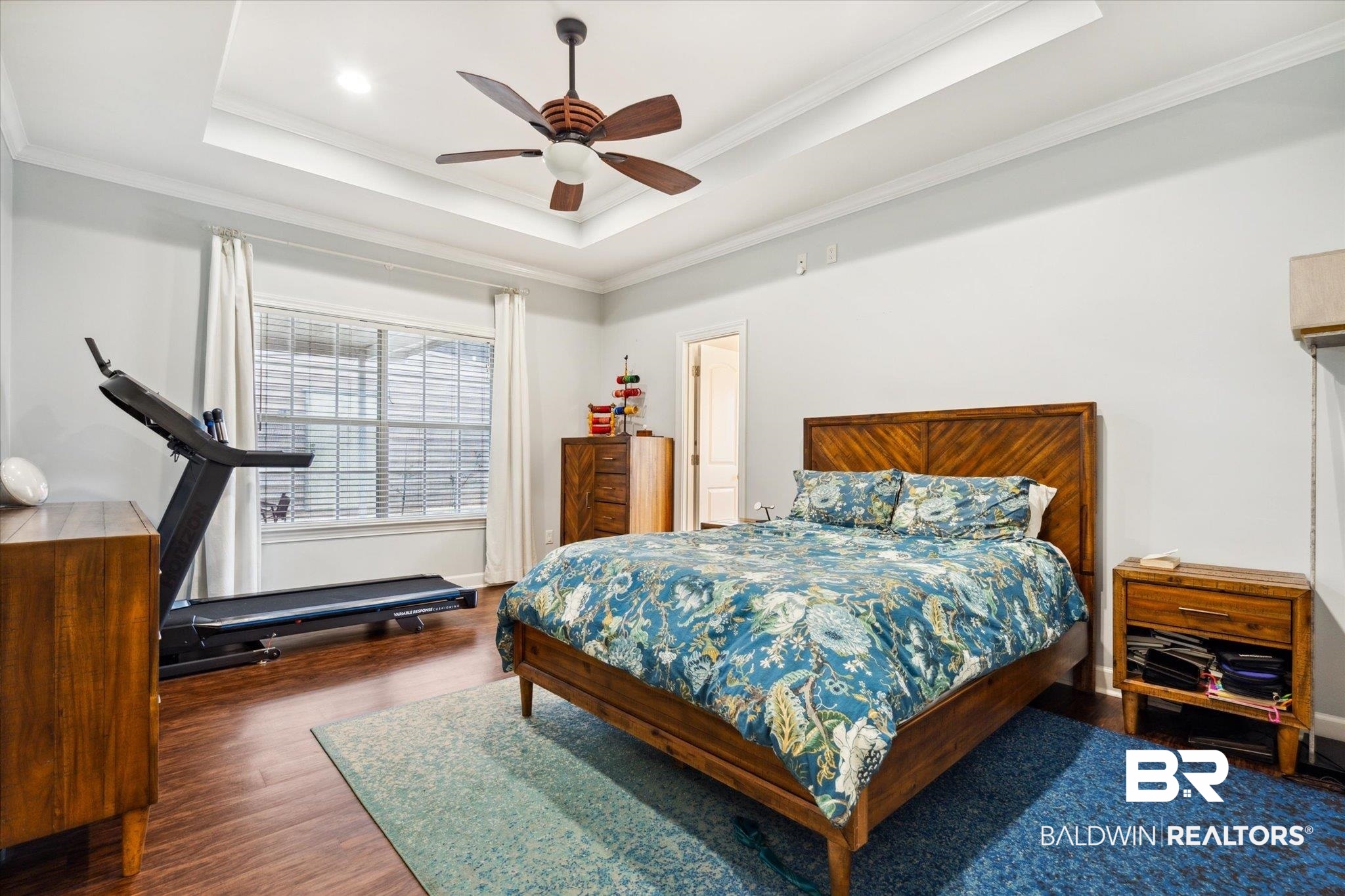 1561 William Dunn Way Mobile, AL 36695 - Photo 11 of 28 Bedroom with a raised ceiling, ornamental molding, hardwood / wood-style floors, and ceiling fan