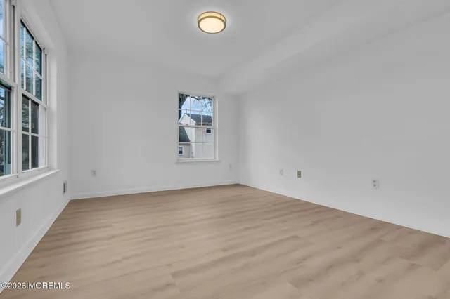 a kitchen with stainless steel appliances granite countertop a refrigerator sink and stove