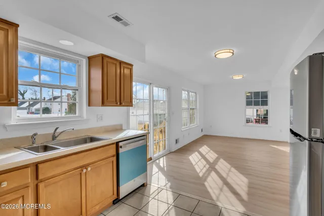a kitchen with a sink and a window