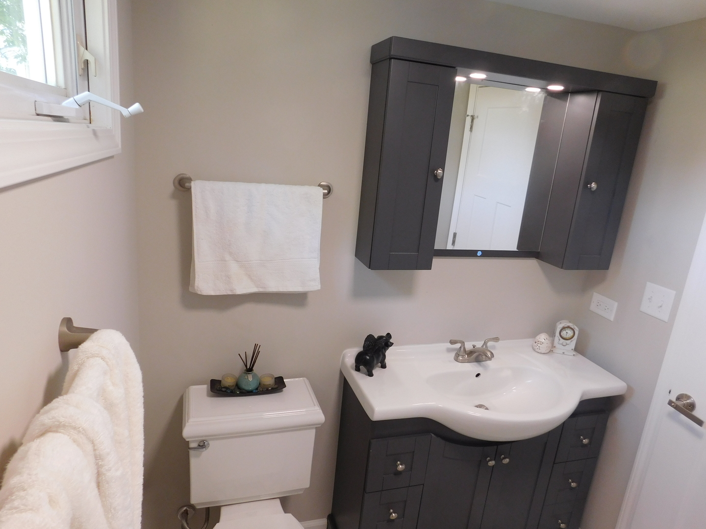 271 Toni Street Bourbonnais, IL 60914 - Photo 13 of 24 a bathroom with a sink toilet and mirror