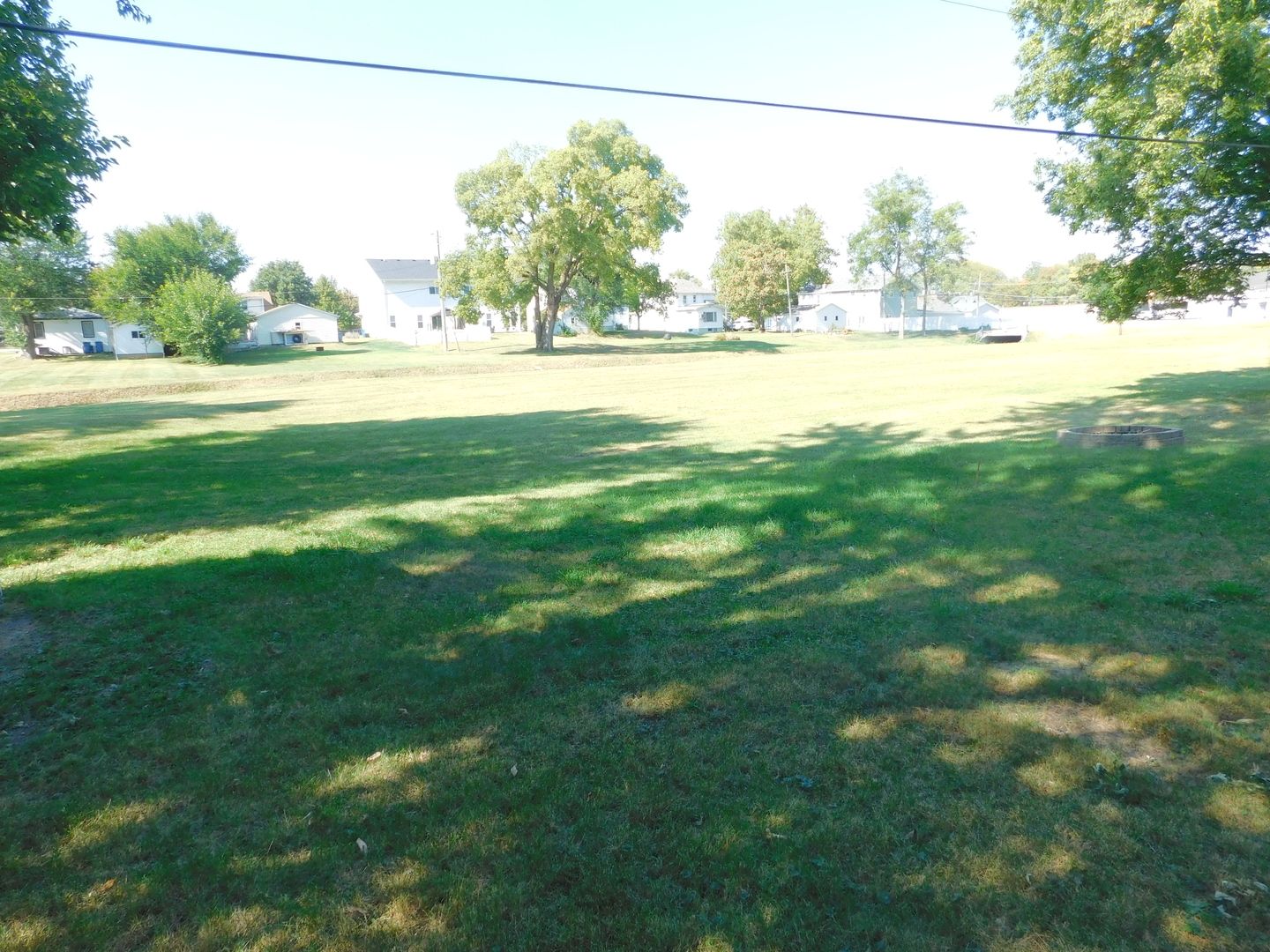 271 Toni Street Bourbonnais, IL 60914 - Photo 5 of 24 a view of a yard with an outdoor space and seating