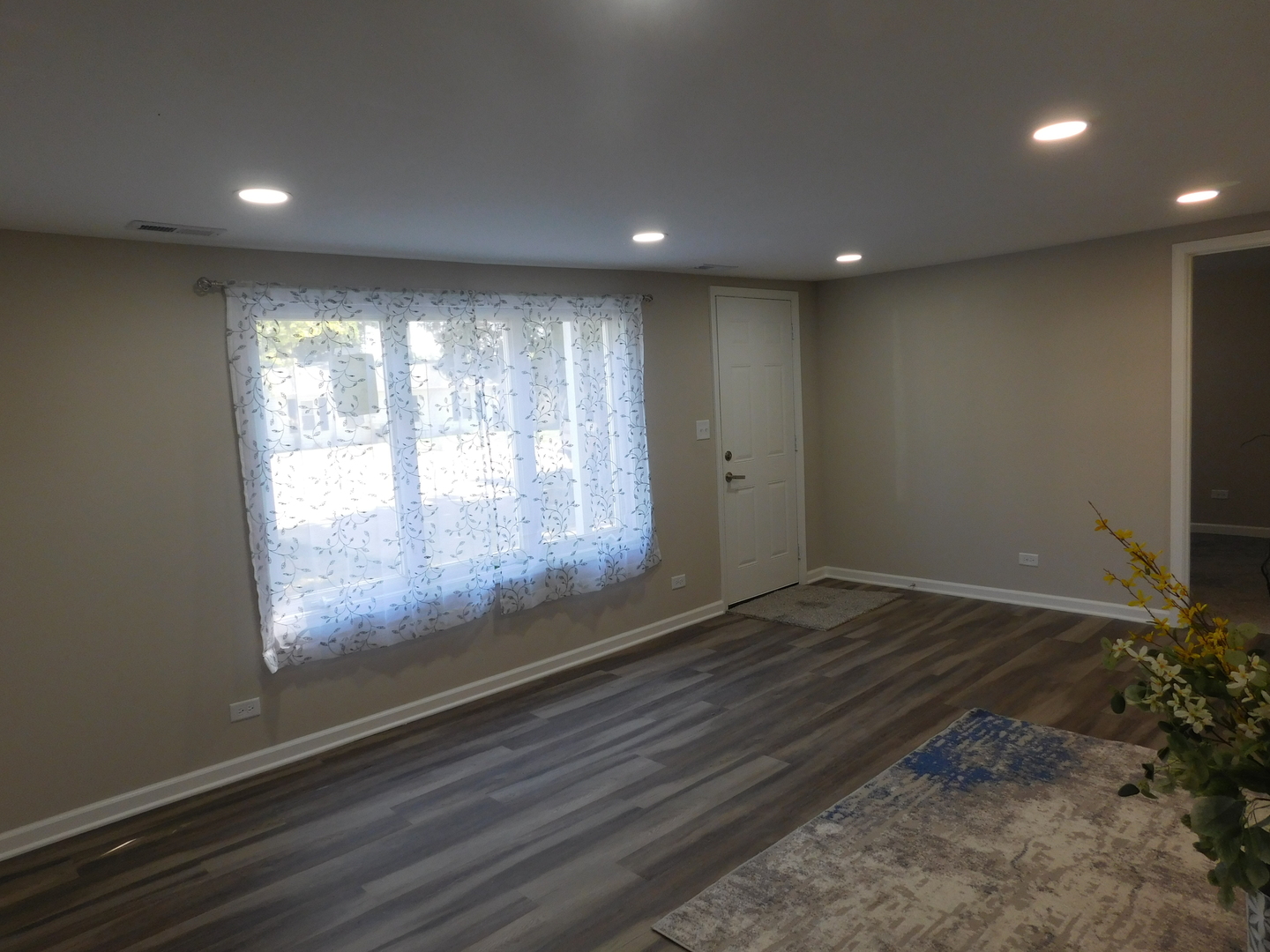 271 Toni Street Bourbonnais, IL 60914 - Photo 10 of 24 a view of empty room with wooden floor and fan