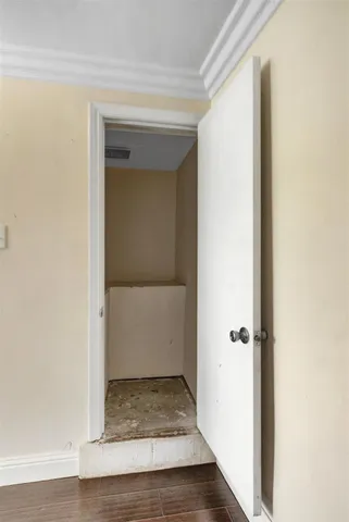 a bathroom with a granite countertop sink a light fixture and a mirror