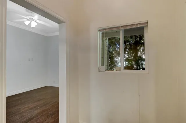 a view of a porch with wooden floor and outdoor space