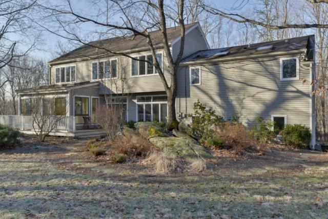 175 Pipers Hill Road Wilton, CT 06897 - Photo 1 of 1 a view of a big house with a yard