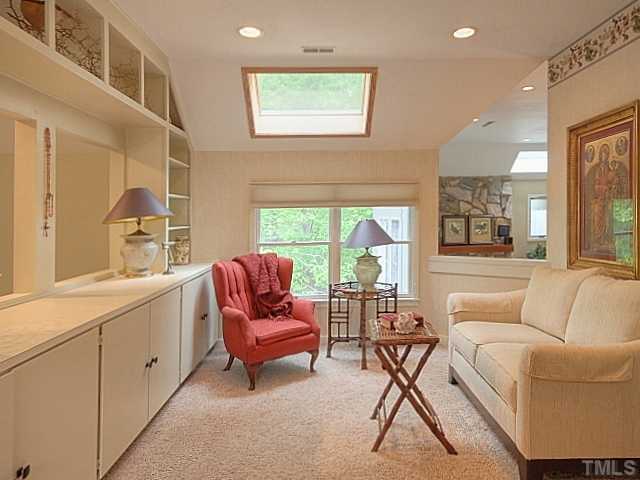 7422 Johnson Mill Road Bahama, NC 27503 - Photo 13 of 25 a living room with furniture and a window