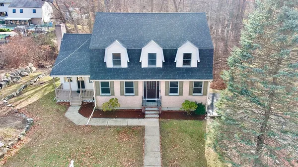 a front view of house with yard view