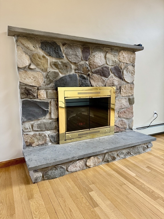 24 Cole Terrace Randolph, MA 02368 - Photo 13 of 40 a view of a fireplace in a room