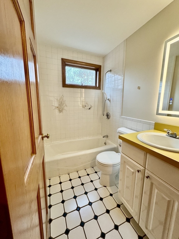 24 Cole Terrace Randolph, MA 02368 - Photo 26 of 40 a bathroom with a sink a toilet and shower