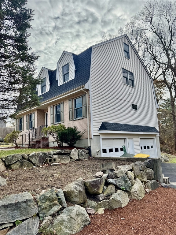 24 Cole Terrace Randolph, MA 02368 - Photo 3 of 40 a front view of a house with a yard