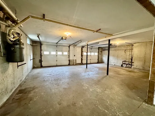 a view of a hallway with seating area