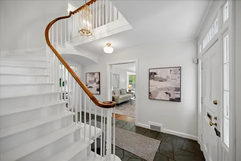 a view of entryway with a front door