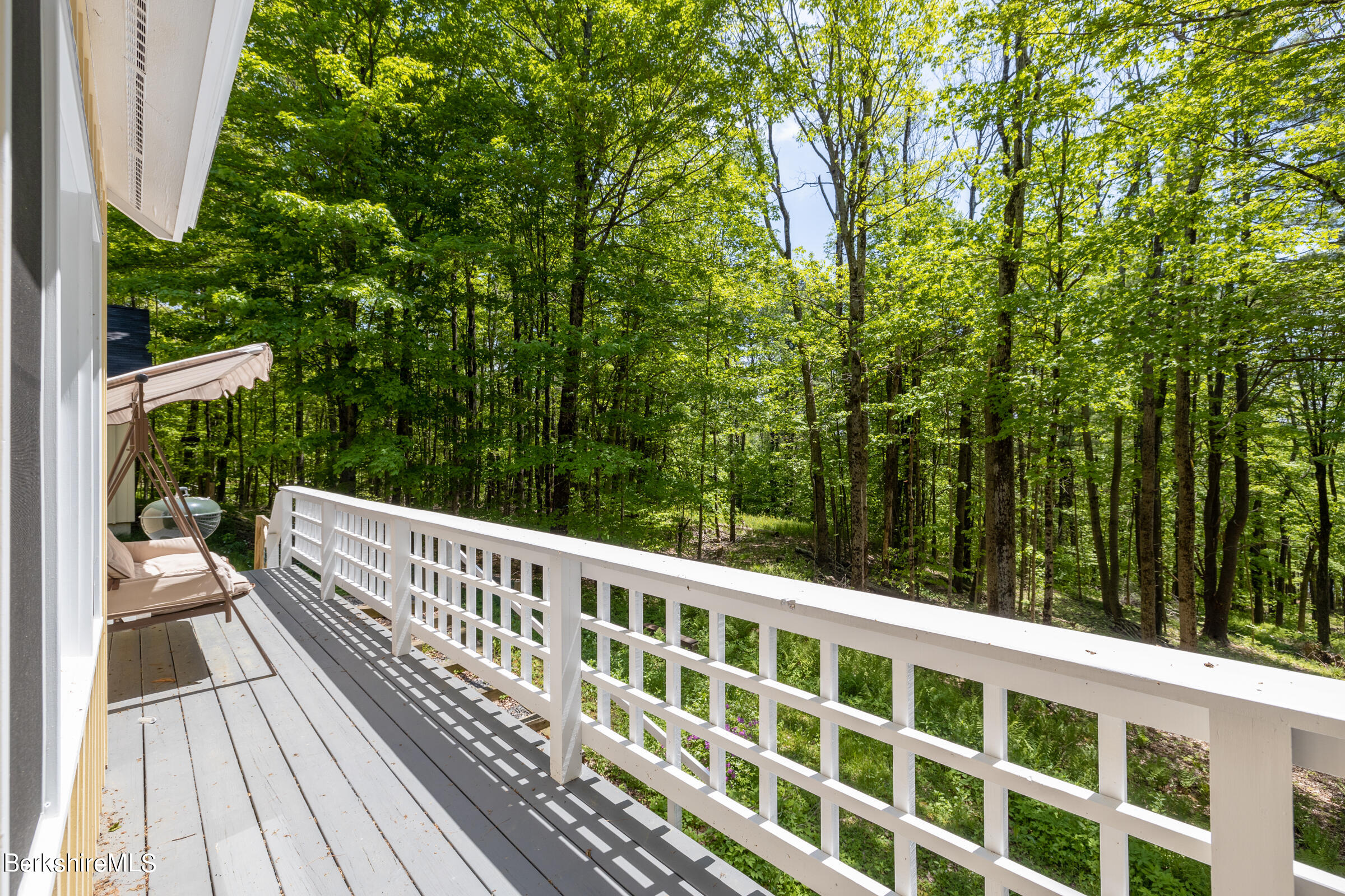255 Hupi Road Monterey, MA 01245 - Photo 12 of 26 a view of balcony with wooden floor and fence