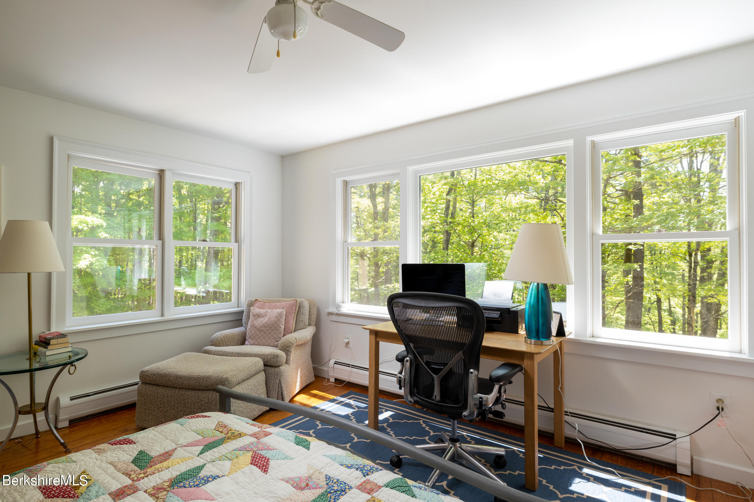 255 Hupi Road Monterey, MA 01245 - Photo 15 of 26 a living room with furniture and a floor to ceiling window