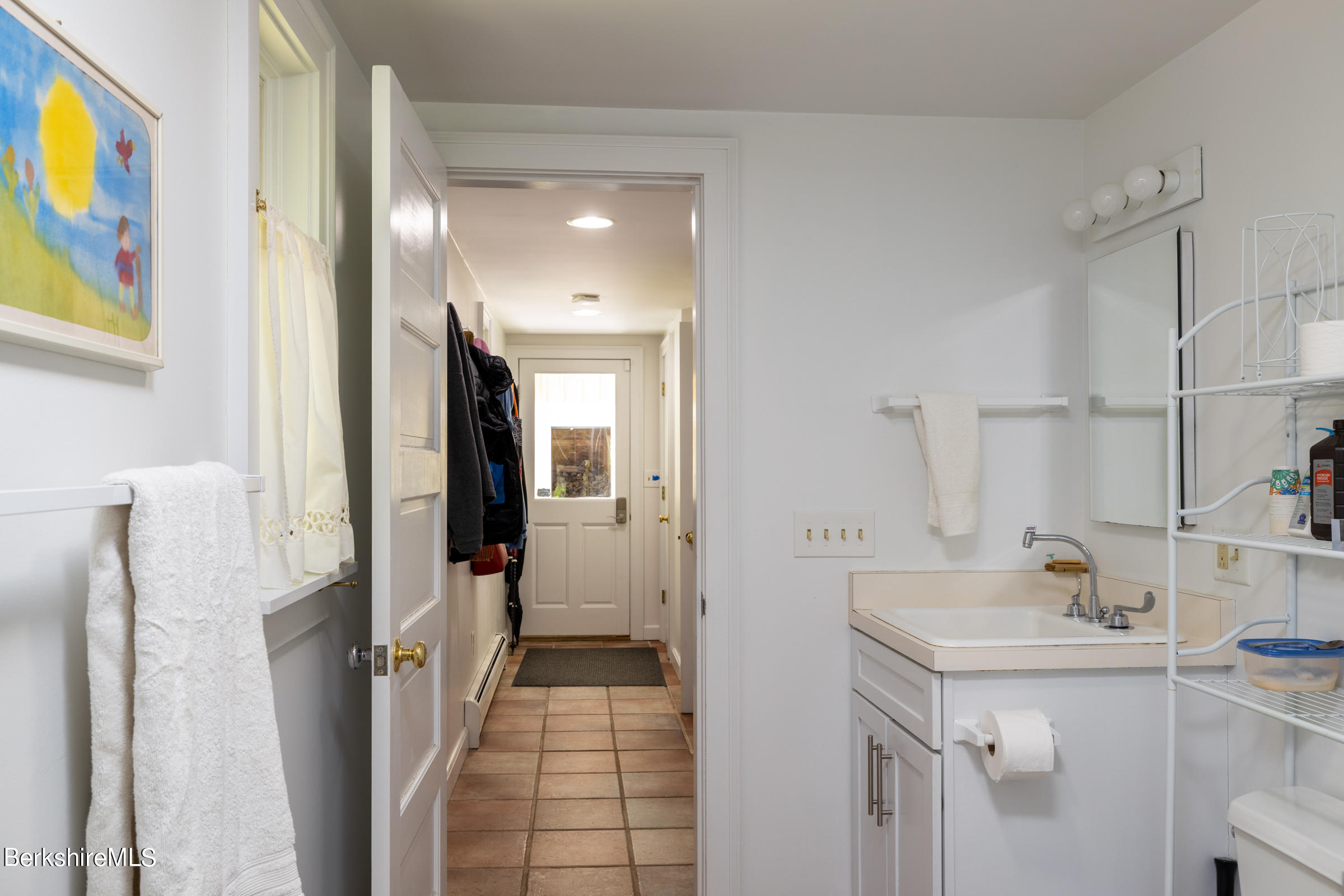 255 Hupi Road Monterey, MA 01245 - Photo 21 of 26 a bathroom with a sink a mirror and a shower