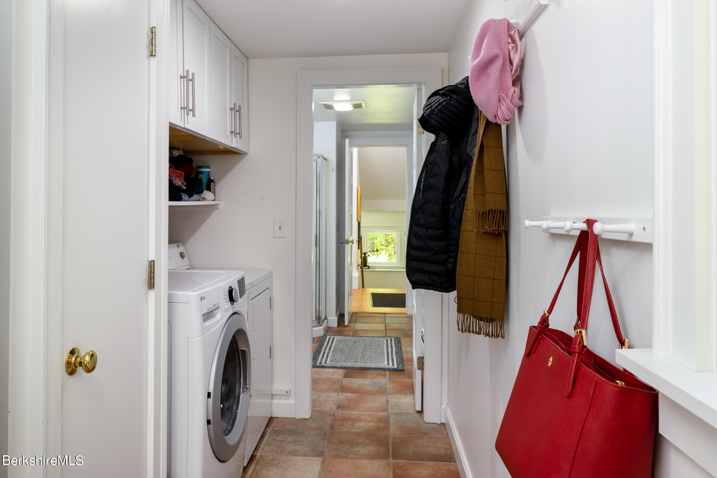 255 Hupi Road Monterey, MA 01245 - Photo 22 of 26 a view of walk in closet with clothes and shoes