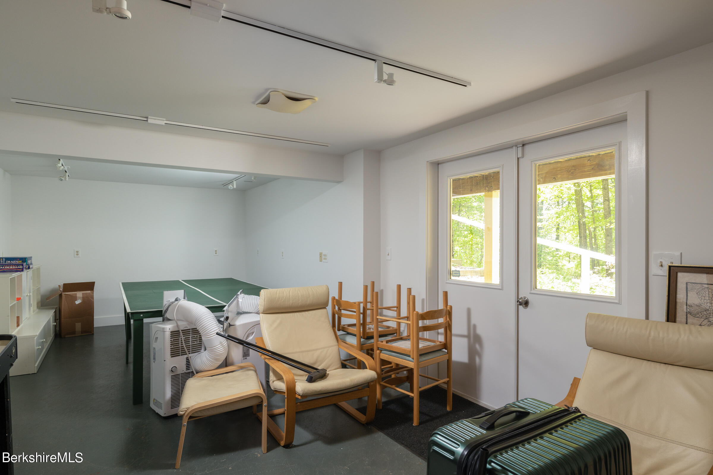 255 Hupi Road Monterey, MA 01245 - Photo 23 of 26 a living room with furniture and a window
