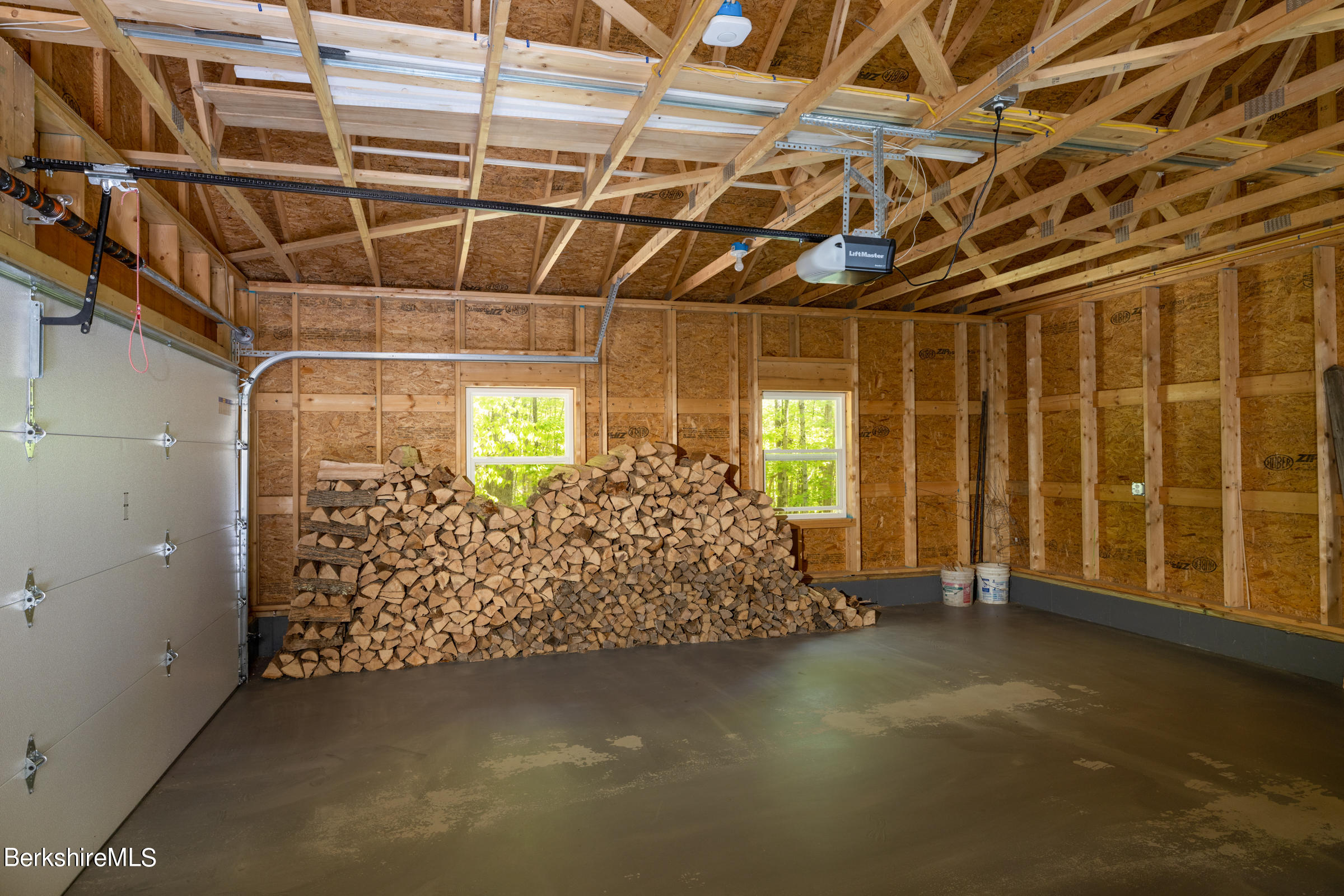 255 Hupi Road Monterey, MA 01245 - Photo 24 of 26 a view of a room with wooden walls