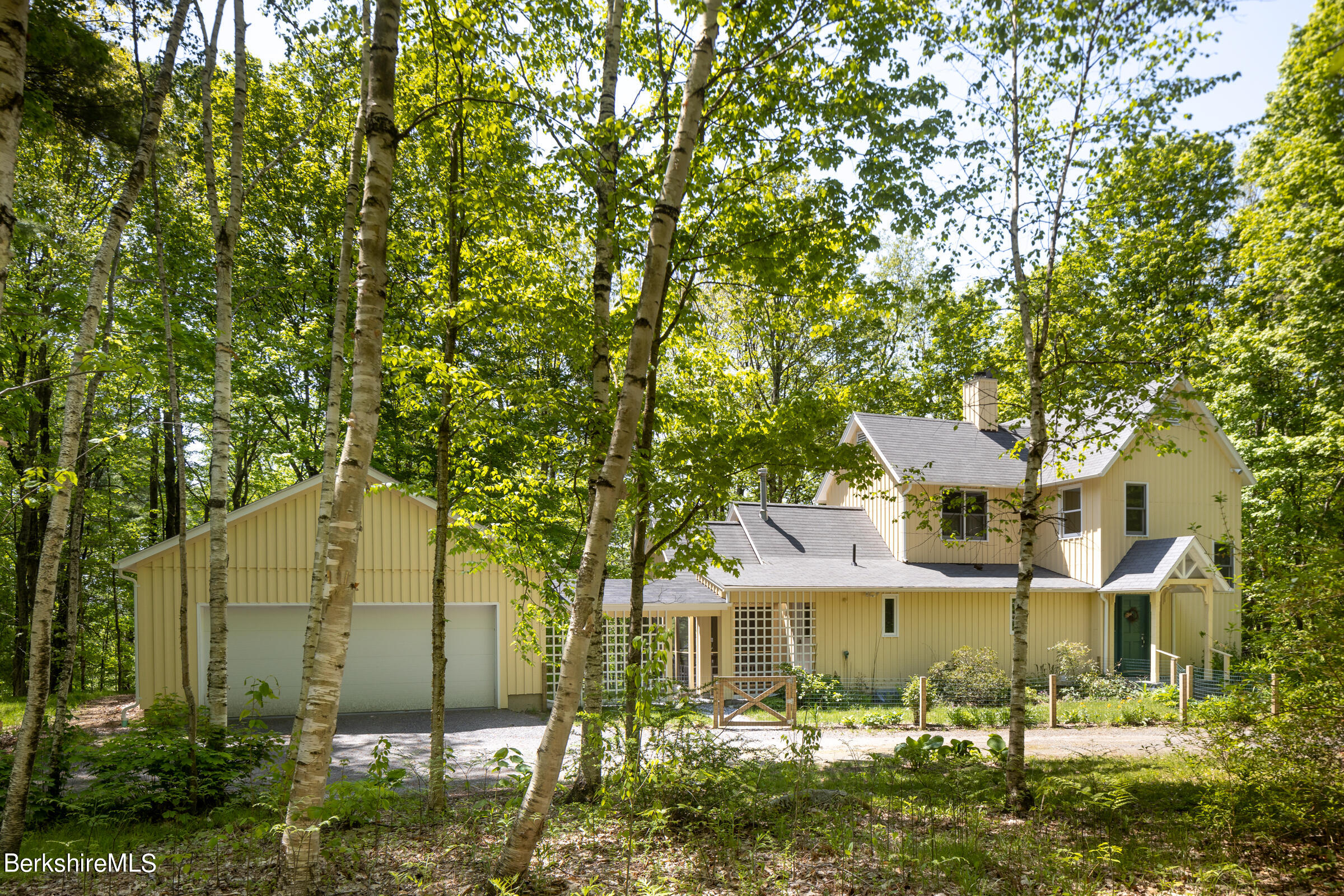 255 Hupi Road Monterey, MA 01245 - Photo 26 of 26 a front view of a house with a yard