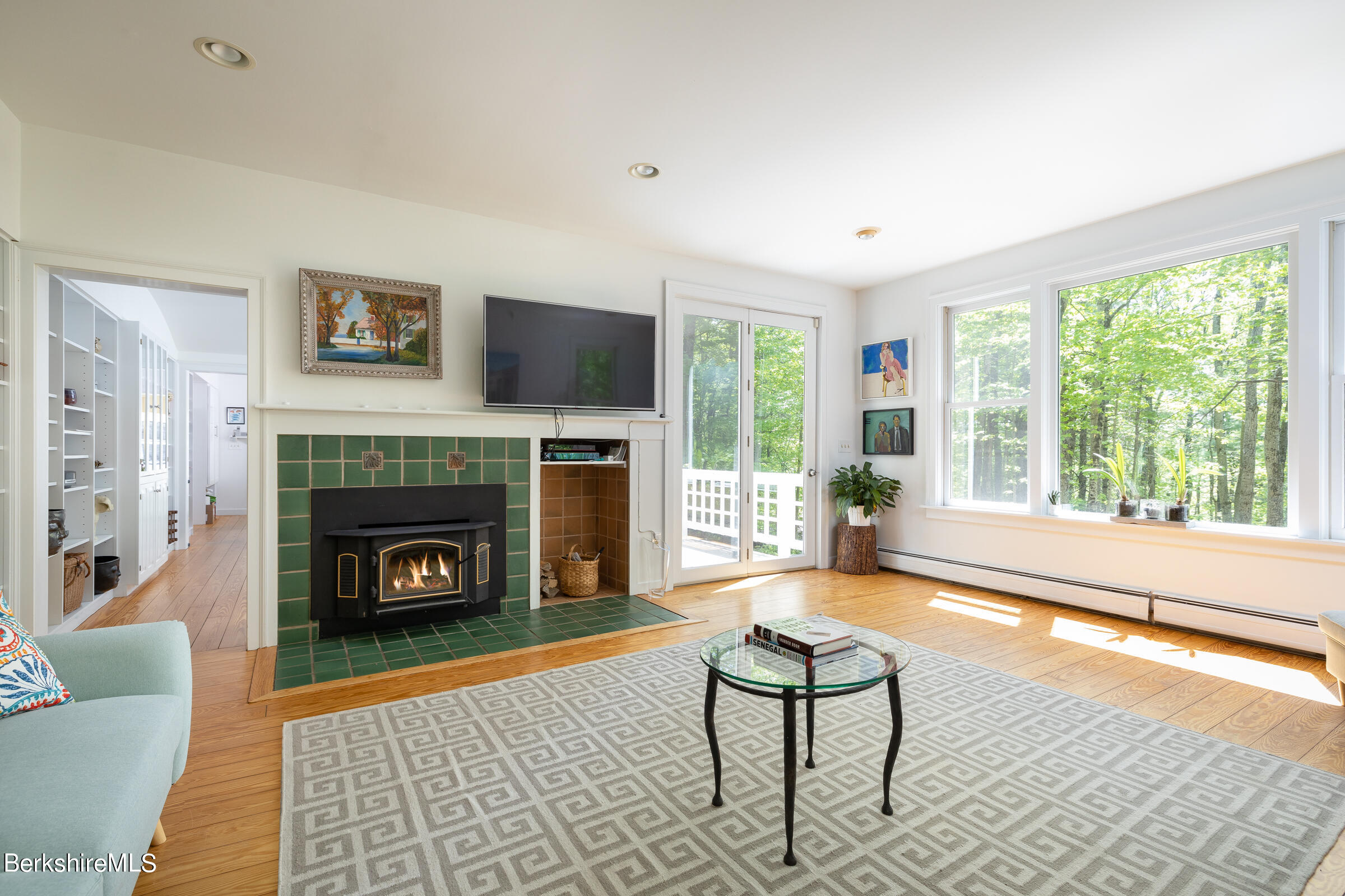 255 Hupi Road Monterey, MA 01245 - Photo 6 of 26 a living room with furniture and a fireplace