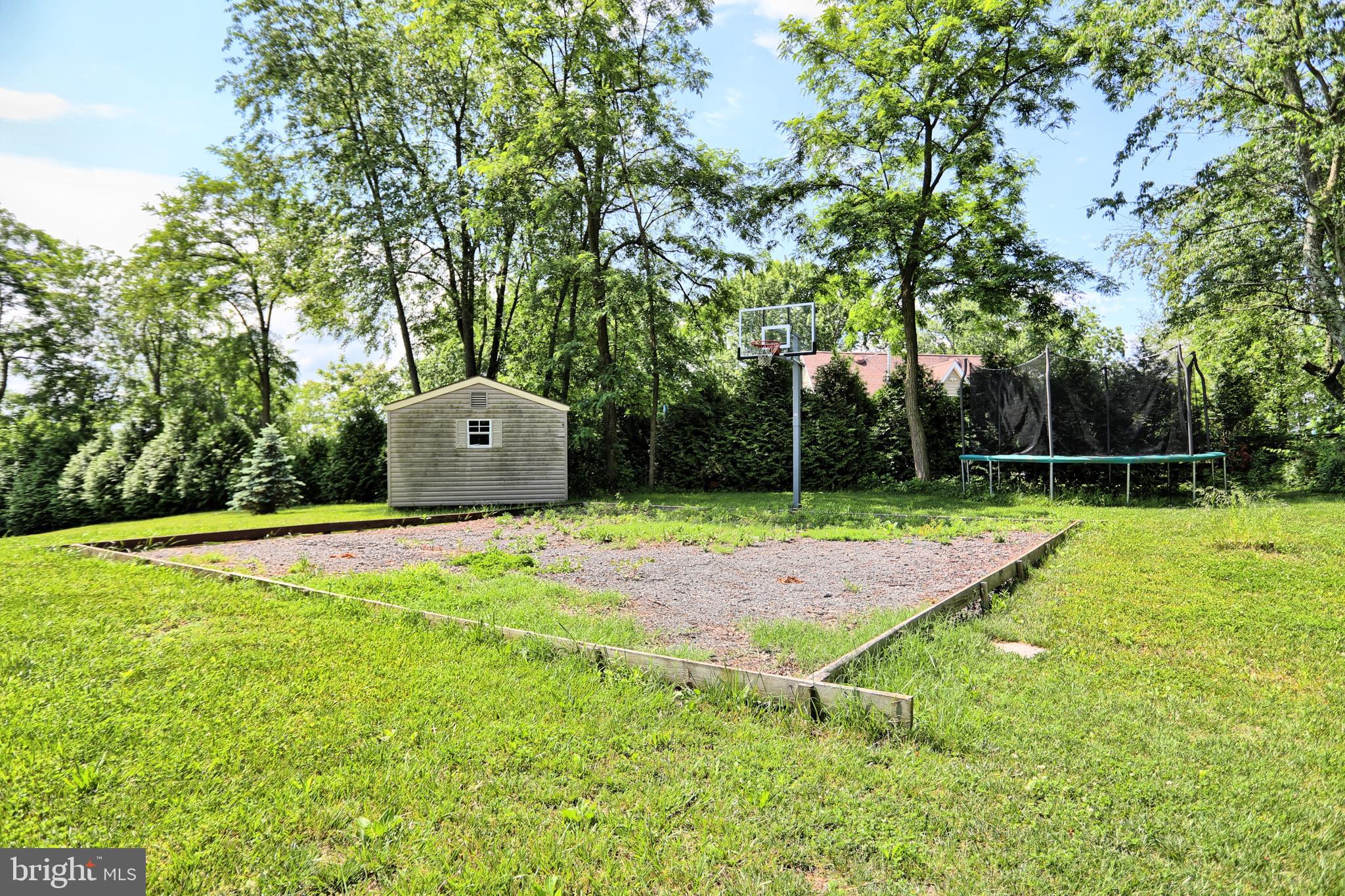 13008 Liberty Road Union Bridge, MD 21791 - Photo 38 of 69 a view of a backyard with swimming pool