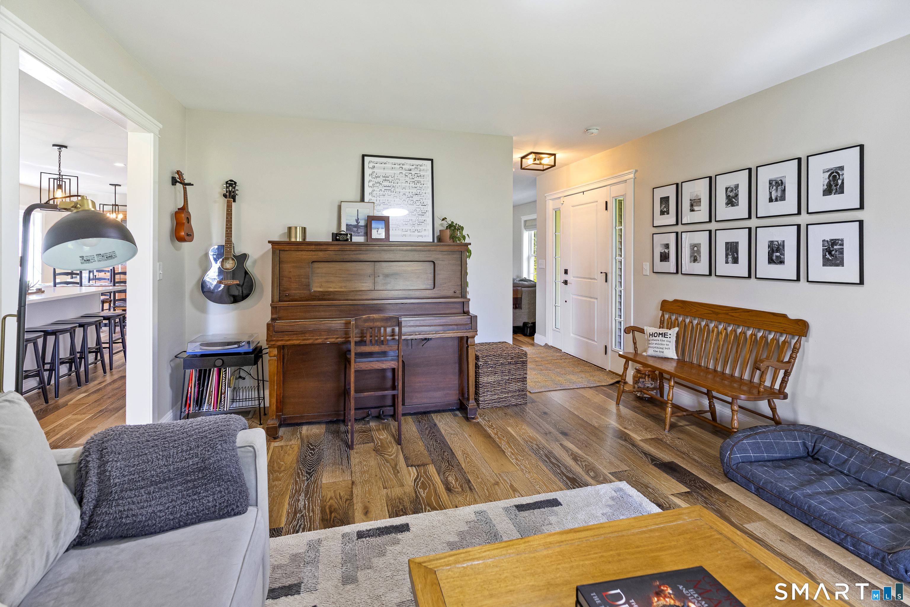 29 Beecher Road Brooklyn, CT 06234 - Photo 25 of 40 a living room with furniture and a table