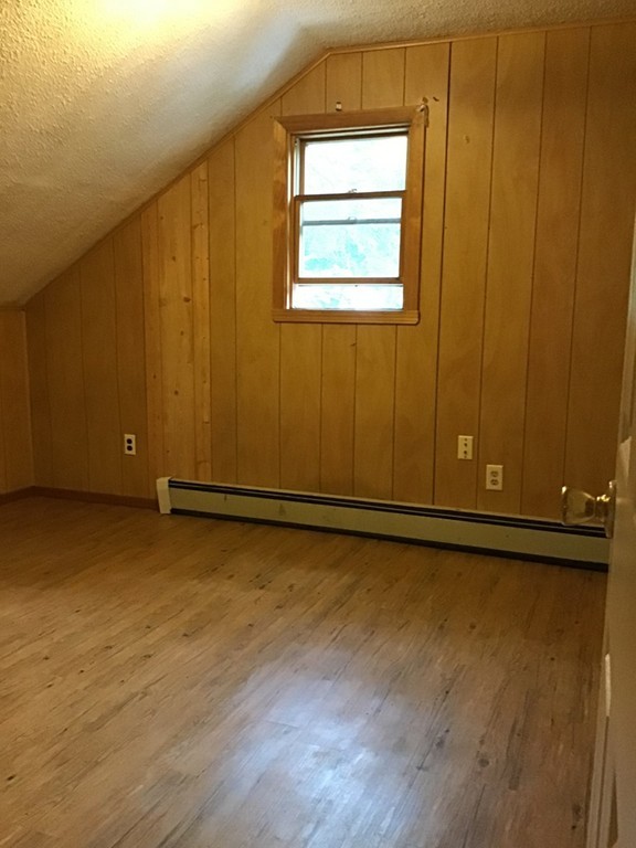 106 Fieldston Street Springfield, MA 01119 - Photo 14 of 14 a view of a room with wooden floor and a window