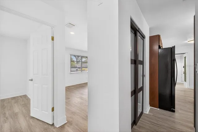 a bathroom with a sink vanity granite toilet and shower