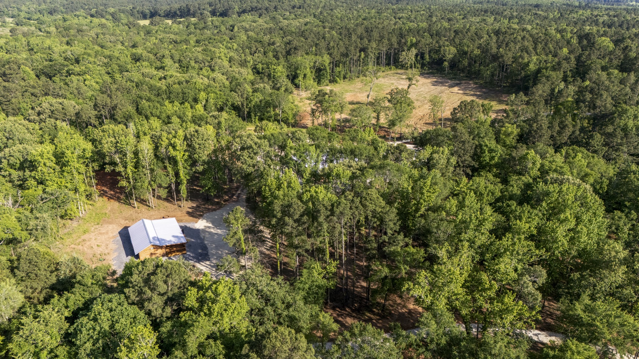 1320 County Road 2112 Rusk, TX 75785 - Photo 16 of 50 a view of a yard with a house