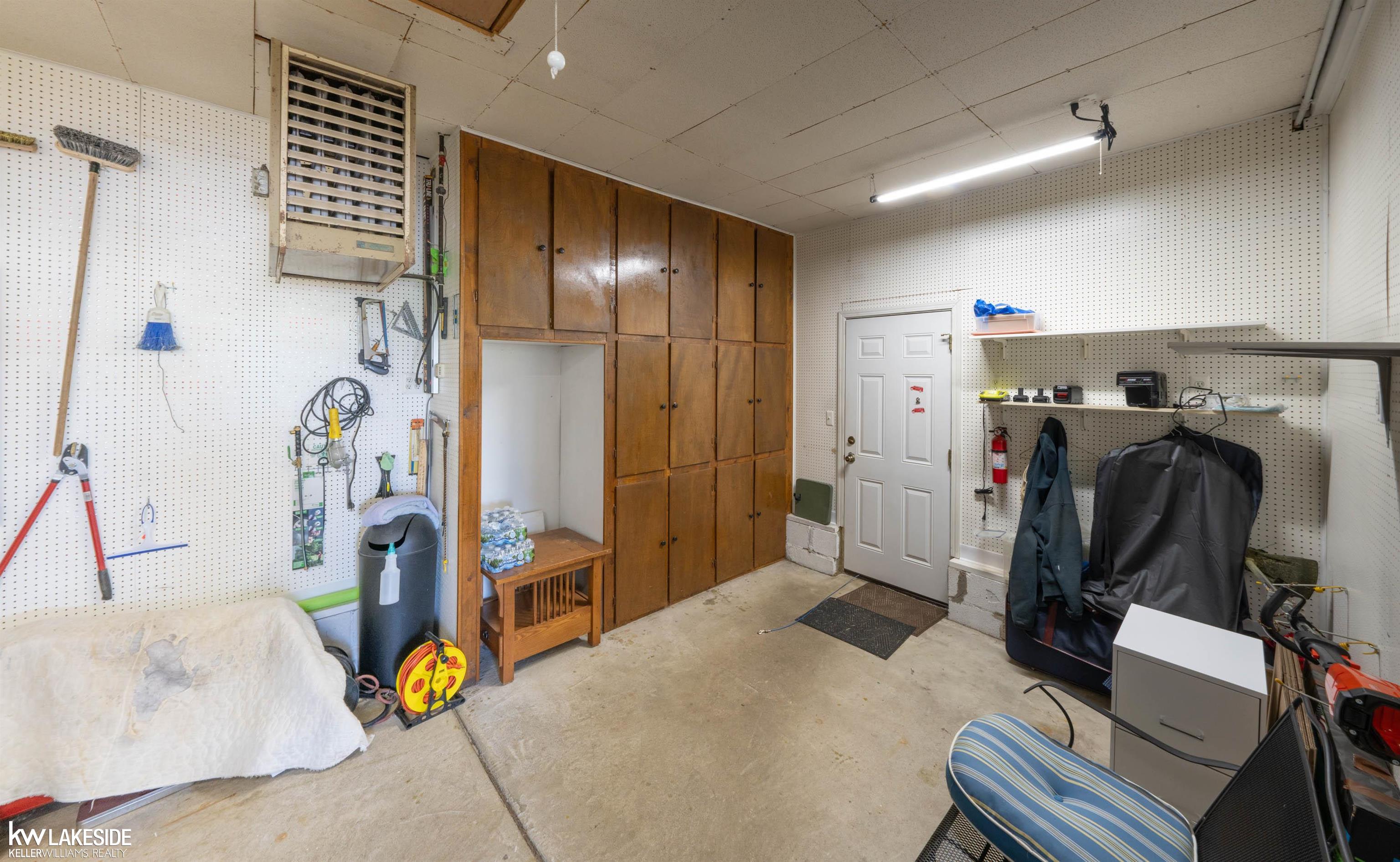 32794 Sutton Road New Baltimore, MI 48047 - Photo 29 of 32 Heated workshop in back of attached garage