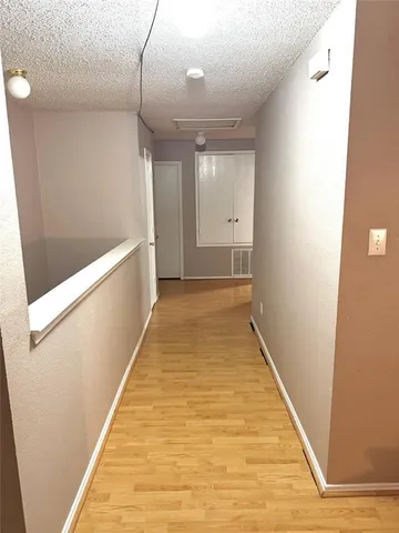 a view of hallway with stairs