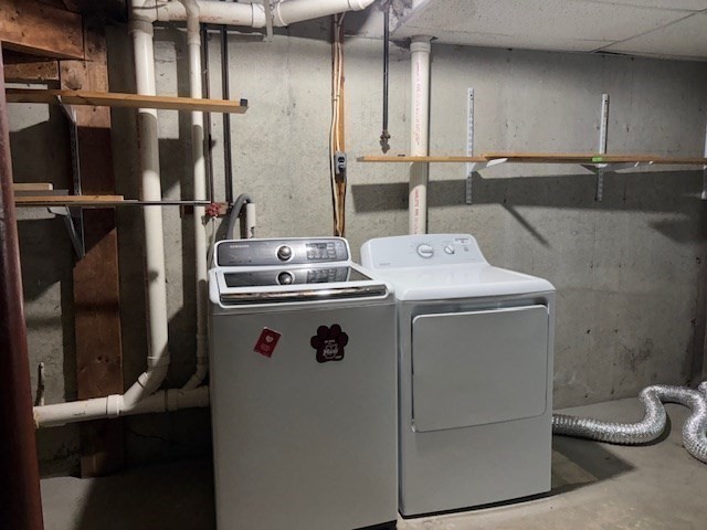 317 Cross Street, Unit 317 Winchester, MA 01890 - Photo 16 of 16 a utility room with dryer and washer