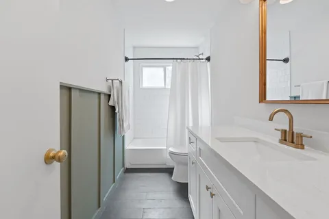 a outdoor living space with patio furniture and a potted plant