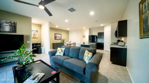 a bedroom with double bed and a flat screen tv