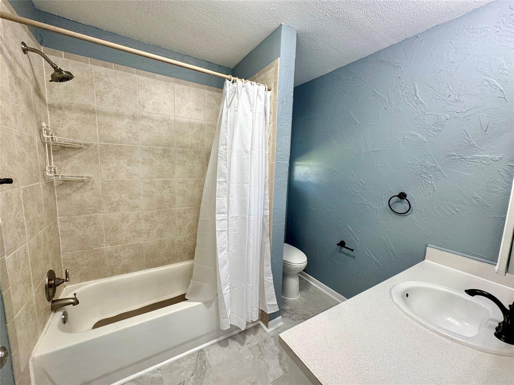 4170 Farm To Market 51 Decatur, TX 76234 - Photo 27 of 36 a bathroom with a toilet and a shower